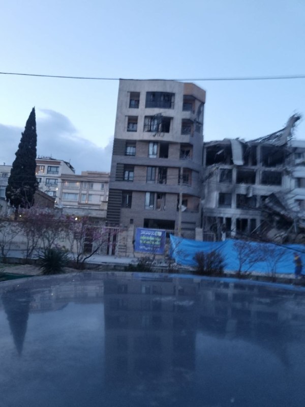 'ساختمانی که حدود ساعت ۲۳ دیشب در جنت‌آباد #تهران هدف قرار گرفت. از دید لاله غربی'تصاویر دریافتی از شهروندان، یکشنبه ۹ فروردینVahid📡 @VahidOnline'ساختمانی که حدود ساعت ۲۳ دیشب در جنت‌آباد #تهران هدف قرار گرفت. از دید لاله غربی'تصاویر دریافتی از شهروندان، یکشنبه ۹ فروردینVahid📡 @VahidOnline