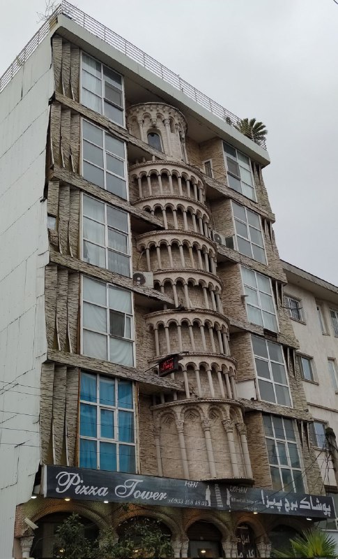 #برج_پیزا در #لاهیجان...via DejhHoodبیا فرض رو بر این بگیریم که این ریدمان یک اثر #معماری بسیار زیبا است، اون کولر گازی و اون تابلو چی میگن اون وسط؟via SahandMotlagh اسم این برج pisaئه! حداقل اسمش رو درست می‌نوشت. pizza رو می‌خورند.behnammodernواکنش‌های زیادی داشته و بعضی‌ها هم  دفاع کردند.#نمای_ساختمان